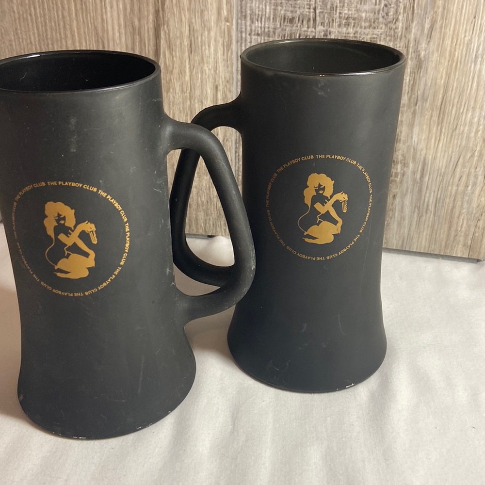 Vintage pair of  if Matte  black playboy club glasses with gold fimlin icon
